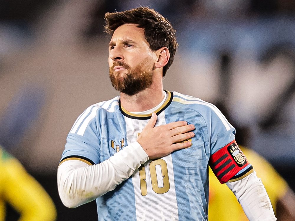 Lionel Messi with his hand on his heart during Argentina vs Benin